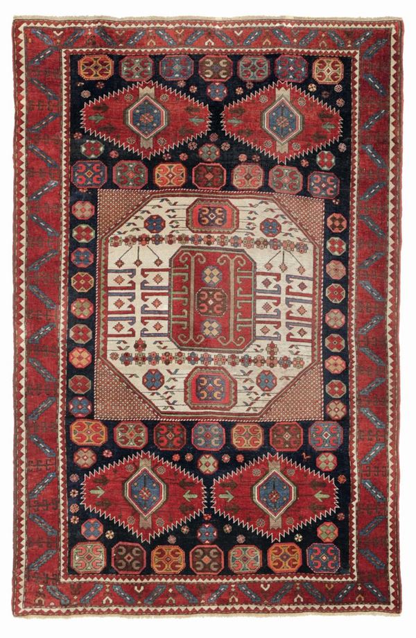 A Kasak Karatchoph rug, Caucasus, late 19th - early 20th century. Some repairs and extremities redone [..]