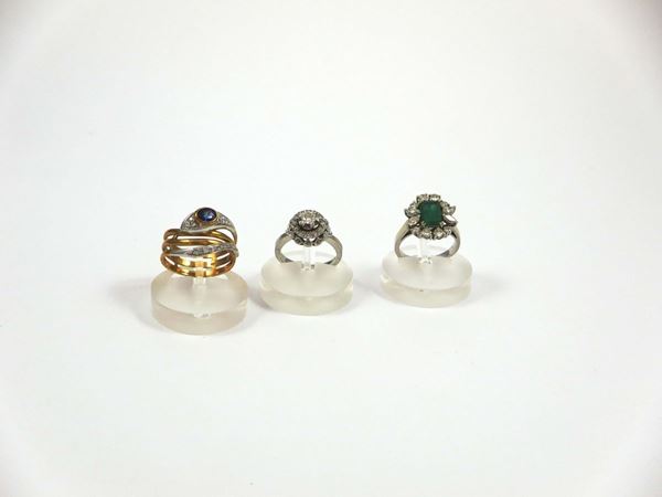 Three gold, diamond, sapphire and emerald rings