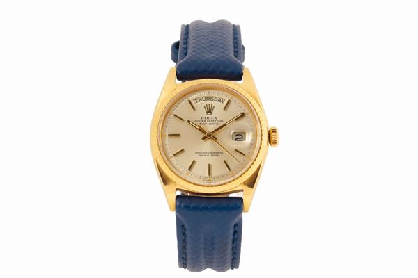 ROLEX, Oyster Perpetual, Day-Date, Superlative Chronometer Officially Certified, REF. 1803, case No. 1903418, Ref. 1803. Made in 1968. Fine, tonneau-shaped, center seconds, self-winding, water resistant, 18K yellow gold wristwatch with day & date. Accompanied by the original box