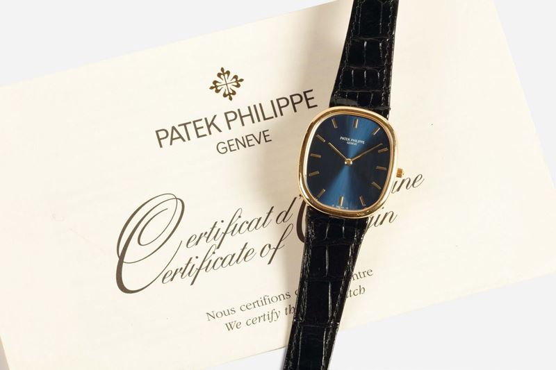 PATEK PHILIPPE, Geneve, ELLIPSE, AUTOMATIC, YELLOW GOLD. Very fine, oval, self-winding, 18K yellow gold wristwatch with an 18K yellow gold Patek Philippe buckle. Made circa 1990. Accompanied by the Certificate  - Auction Watches and Pocket Watches - Cambi Casa d'Aste