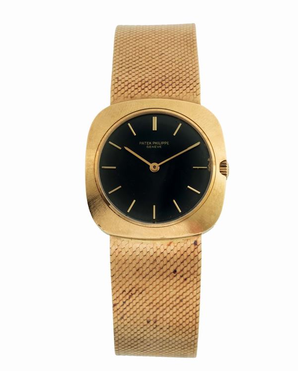 PATEK PHILIPPE, Geneve, REF. 3543, case No. 2690868, 18K yellow gold wristwatch with an original patek Philippe integrated bracelet. Made circa 1970