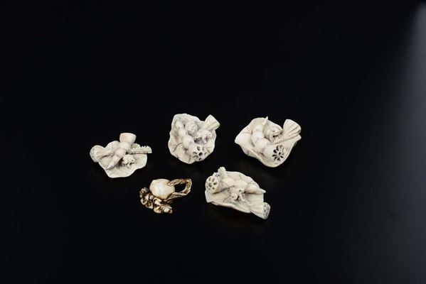 Five carved ivory fruits and lotus flowers, Japan, early 20th century