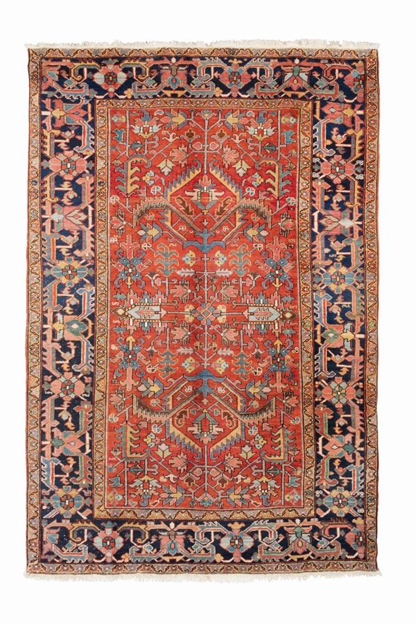 A Heriz rug, early 20th century, cm 302x210