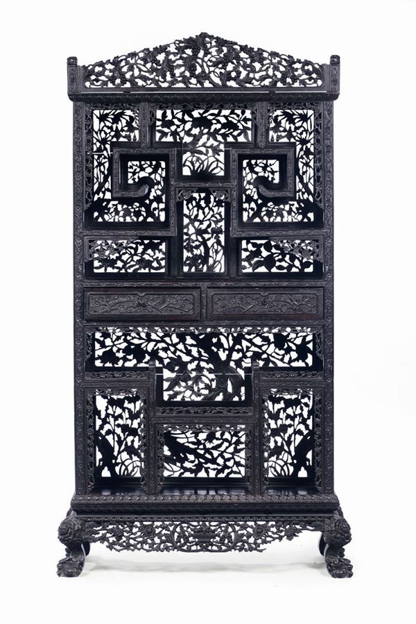 A fretworked wood exhibitor with two drawers, China, Qing Dynasty, 19th century
