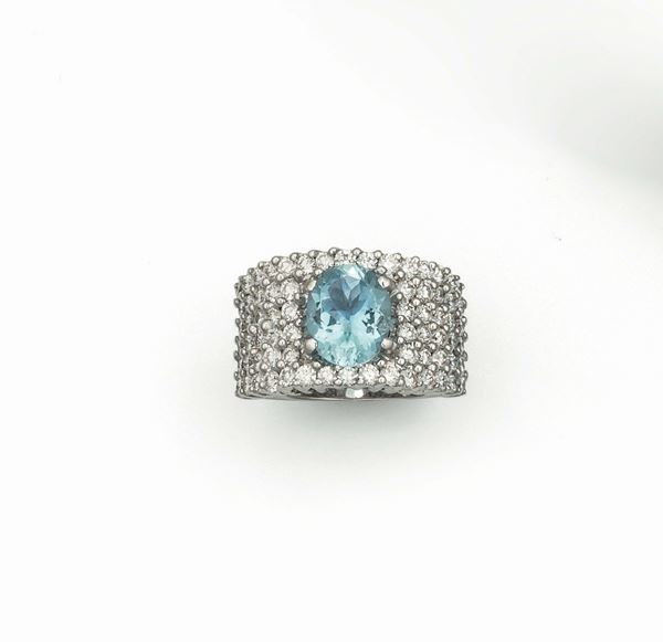 Aquamarine and diamond ring set in white gold