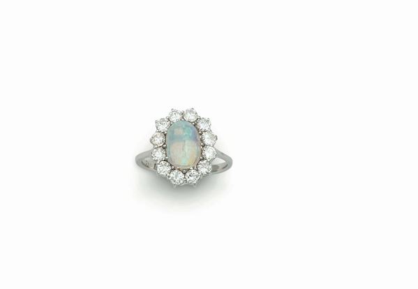 Opal and diamond cluster ring set in white gold