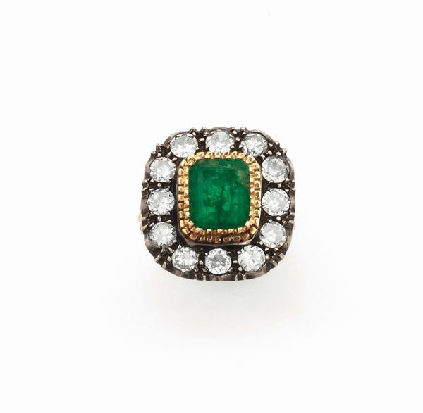 Emerald and diamond cluster ring set in gold and silver
