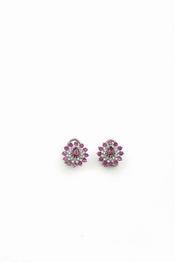 A pair of pink sapphire and diamond earrings