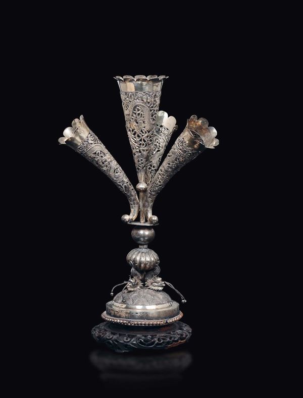 A fretworked silver flower pot with dragons, China, Qing Dynasty, 19th century