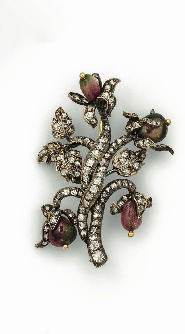 Floral brooch with rose-cut diamond and tourmaline set in gold and silver