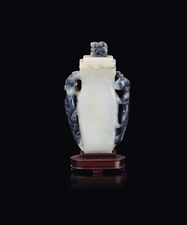 A yellow and russet jade vase and cover, China, Qing Dynasty, 19th century