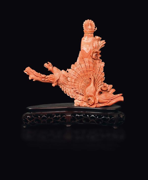 A carved coral peacocks and vase group, China, early 20th century