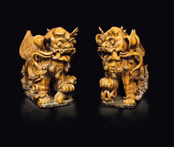 A pair of large glazed pottery figures of Pho dogs, China, early 20th century