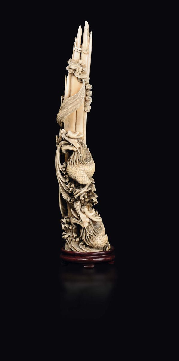 A carved ivory group with dragons, China, qing Dynasty, late 19th century