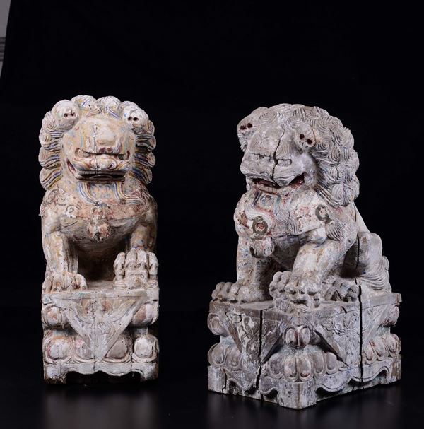 a pair of carved wood Pho dogs, China, Qing Dynasty, 19th century