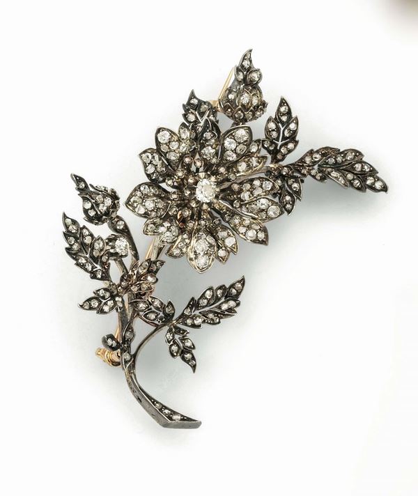 Floral en tramblant rose-cut diamond brooch set in yellow gold and silver. Numerated 3325