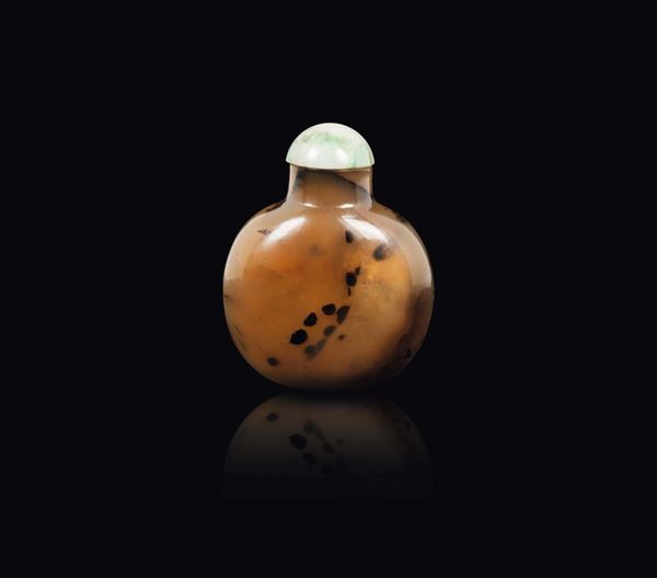 A moss agate snuff bottle with jadeite stopper, China, Qing Dynasty, 19th century