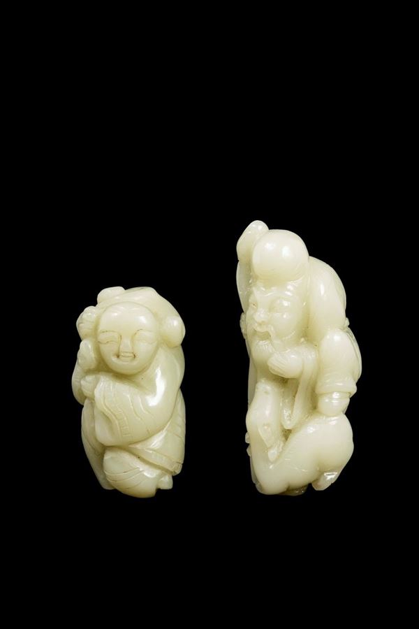 Two white jade figures, a wayfarer and a wise man with stick, China, 20th century