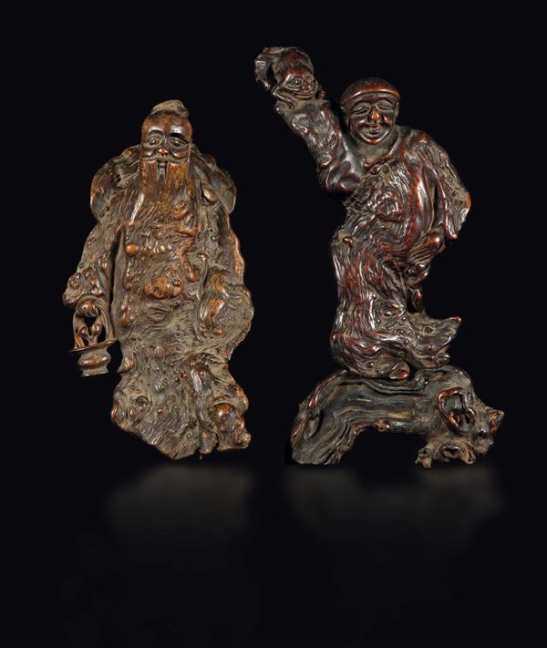 A carved huanghuali root figure of wise man with basket and a carved homu root figure of wise man with monkey, China, Qing Dynasty, 19th century
