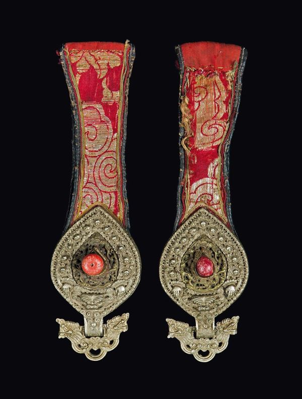 A pair of silk and silver medals, Tibet, 19th century