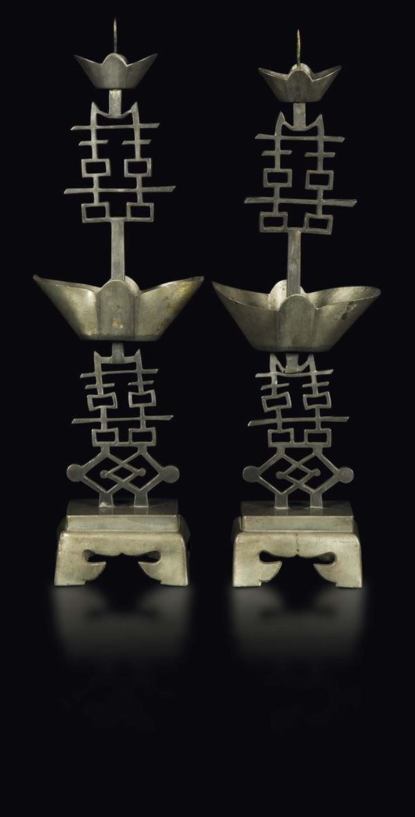 A pair of pewter marked candlesticks, China, Qing Dynasty, 19th century