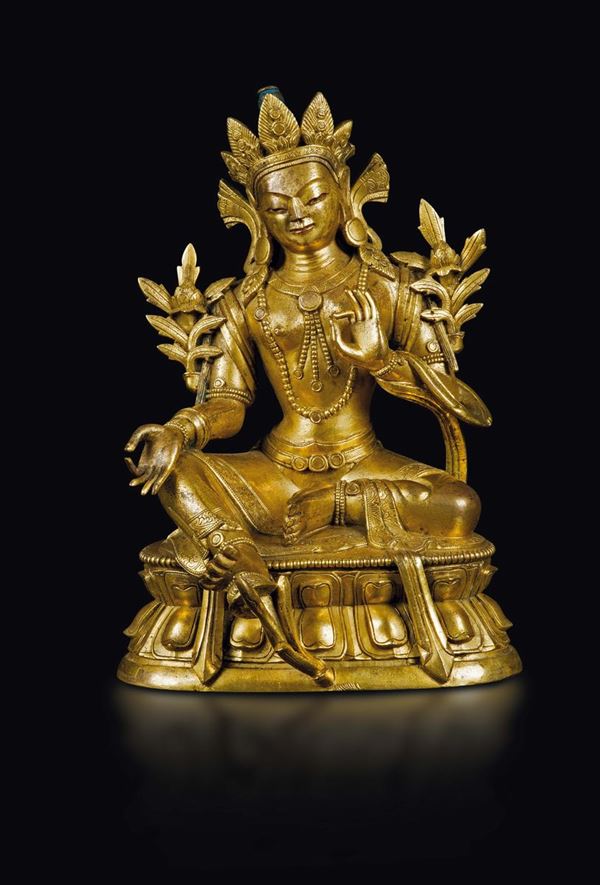 A fine gilt bronze figure of Amitaya seated on a double lotus flower, China, Qing Dynasty, 18th century