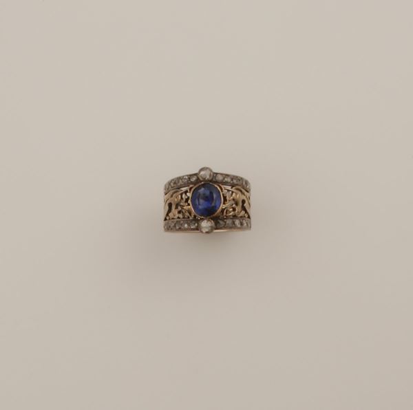 Sapphire, gold and silver ring