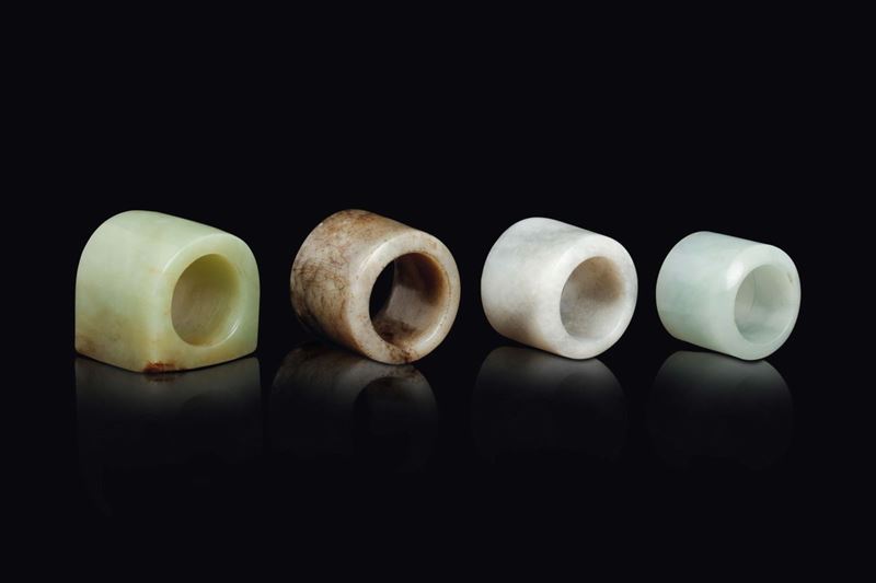 Four Celadon white and grey jade bowman rings, China, Qing Dynasty, late 19th century  - Auction Fine Chinese Works of Art - Cambi Casa d'Aste