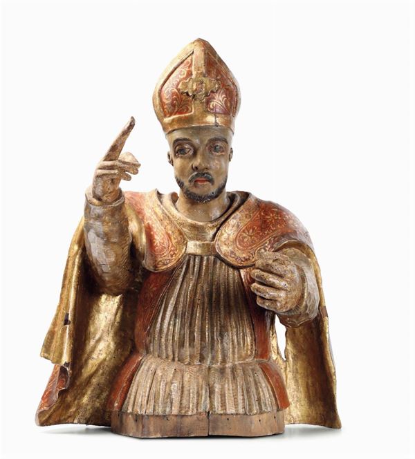 A bust of a Bishop Saint (Saint Nicholas?) in gilt and painted wood. Sculptor from central-Southern Italy, first half of the 17th century.