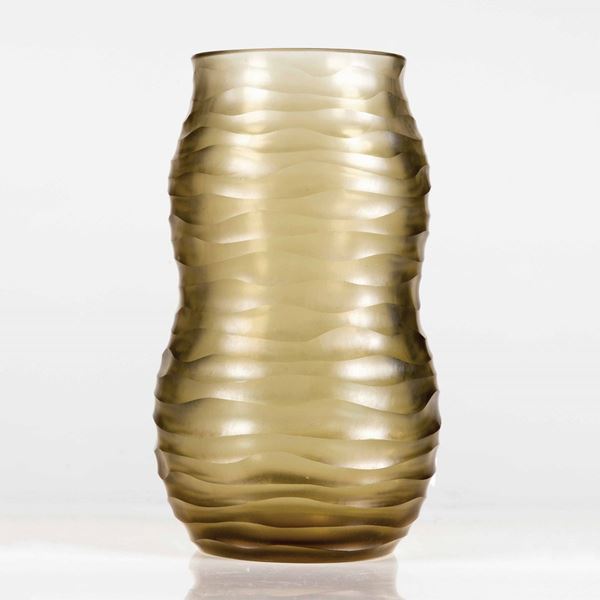 Miroslav Hrstka, Venini, Murano, 1968 ca. A carved straw-coloured glass vase.