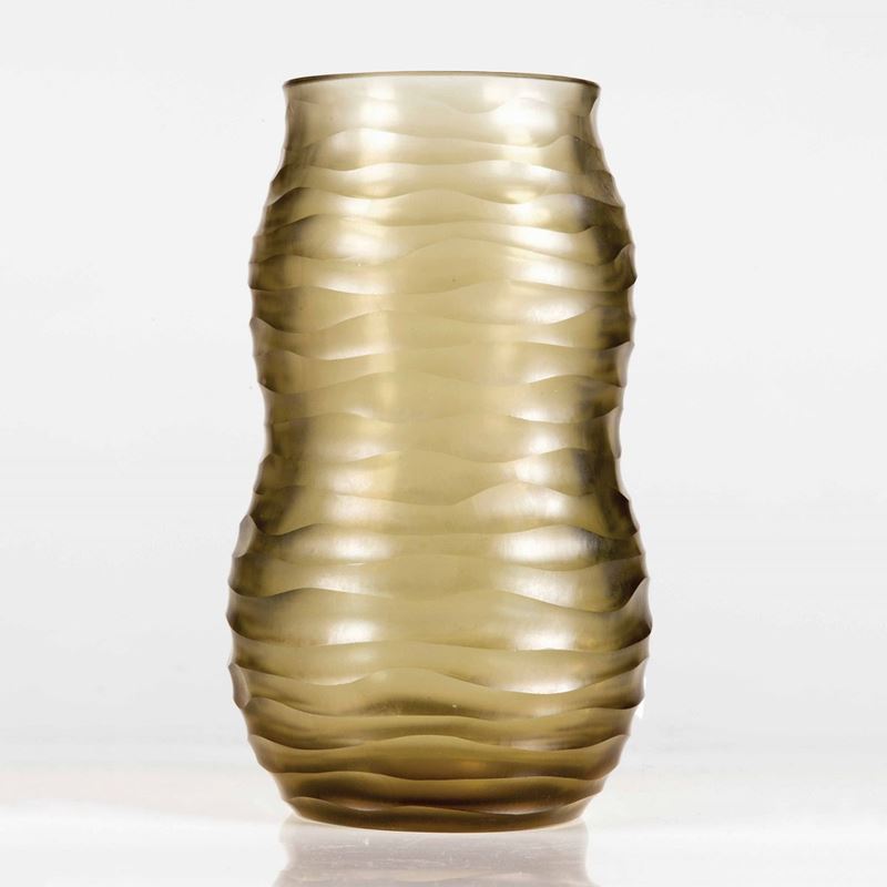 Miroslav Hrstka, Venini, Murano, 1968 ca. A carved straw-coloured glass vase.  - Auction Murano, 20th Century. 150 Collectable Glasses - I - Cambi Casa d'Aste