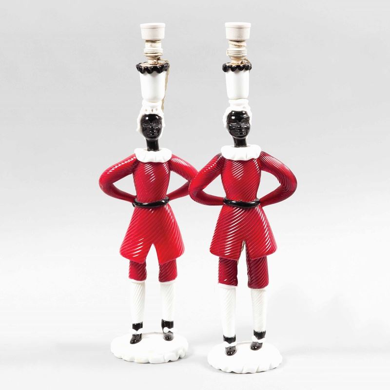 Fulvio Bianconi, Venini, Murano, 1948 ca. A pair of figurines in red glass, milk glass and black glass, depicting "Mori" holding candles.  - Auction Murano, 20th Century. 150 Collectable Glasses - I - Cambi Casa d'Aste