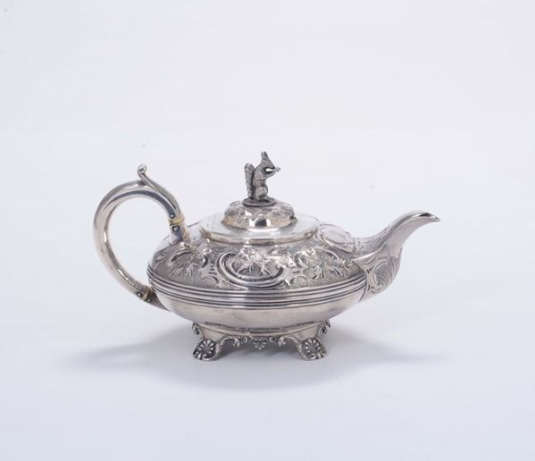 A teapot in molten, embossed and chiselled silver, London 1828, silversmith Richard Pierce & George Burrows