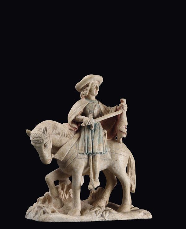 A limestone sculpture with traces of polychromy, depicting Saint Martin cutting the cape, Burgundian art from the beginning of the 16th century