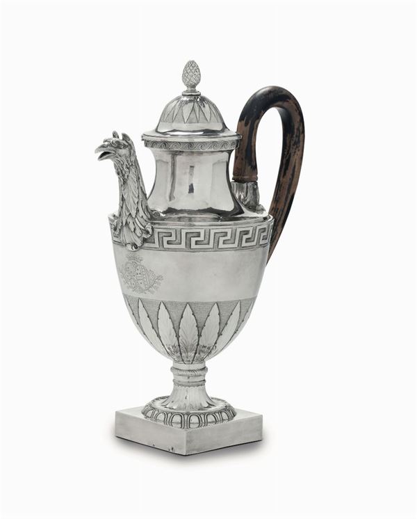 A coffee pot in embossed, chiselled and engraved silver with a wooden handle, Rome, end of the 18th century, cameral stamp and mark for silversmith Giuseppe (III) Spagna (1791 - 1817)