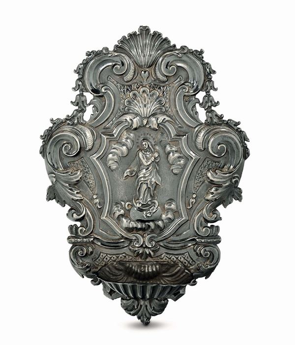 A holy water font in embossed and chiselled silver, Genova, first half of the 18th century