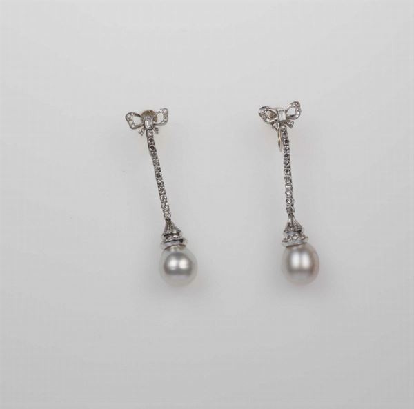 Pair of cultured pearl, diamond and platinum pendent earrings