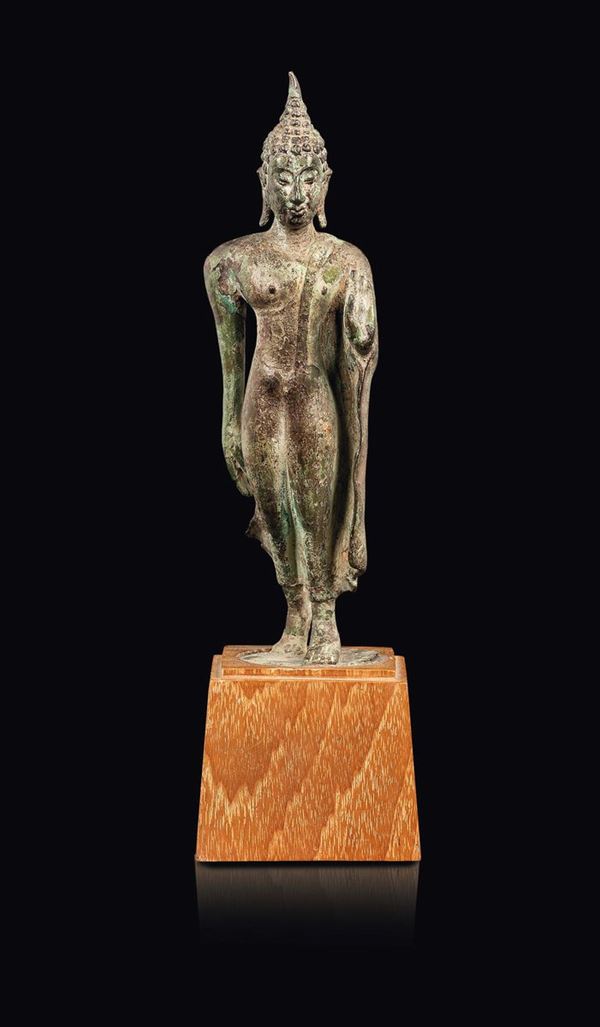 A bronze figure of standing Buddha, Thailand, 13th century
