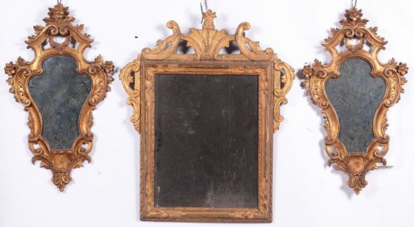 Specchiera e coppia di appliques in legno intagliato e dorato, XVIII-XIX secolo