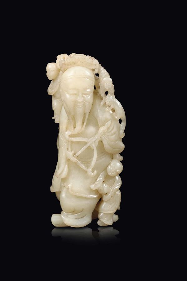 A carved white jade figure of a wiseman with bow and children, China, Qing Dynasty, 18th century