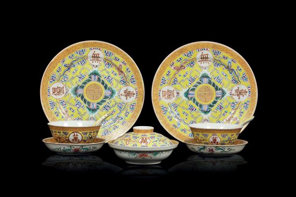 A lot of yellow-ground porcelains: a pair of dishes, a cup and cover and a pair of cups with small dishes and spoons, China, Qing Dynasty, Guangxu Mark and of the Period (1875-1908)