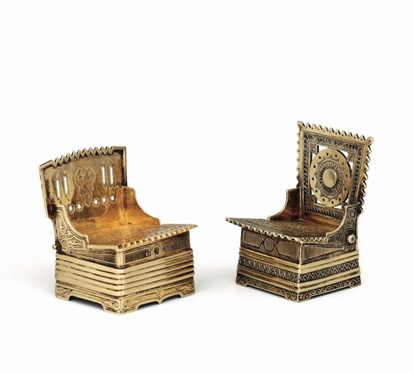 Two throne-shaped salt cellars in molten, embossed, chiselled and gilded silver, Russia 19th century, Moscow 1873 assayer Viktor Savinkov, Moscow 1867 assayer G(?)C