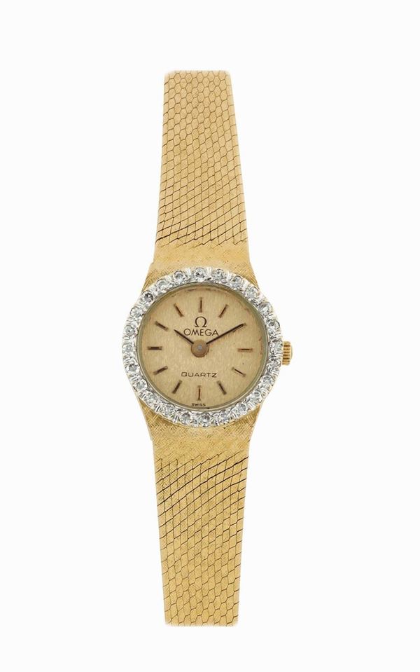 OMEGA, orologio da polso, da donna, al quarzo, in oro giallo 14K e brillanti con bracciale in oro originale. Realizzato nel 1970 circa