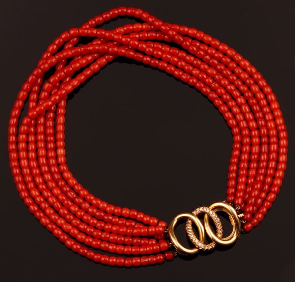 Six rows of coral beads necklace with a diamond and gold clasp