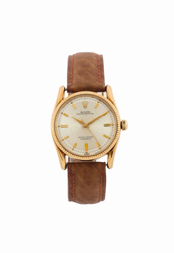 ROLEX, Oyster Perpetual, Officially Certified Chronometer, Bombay, case No. 136979, Ref. 6593.  Fine, centre second, self-winding, water-resistant, 14K yellow gold wristwatch with a gold-plated Rolex buckle. Made in the 1950's.