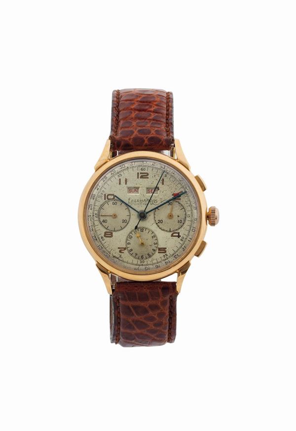 Eberhard & Co., case No. 649927. Fine and rare, 18K yellow gold wristwatch with square button chronograph, registers,  triple date calendar and original buckle. Made circa 1950