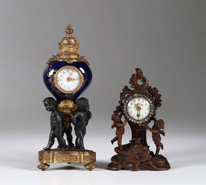 Due piccoli orologi con puttini, XIX-XX secolo  - Auction Fine Art - Cambi Casa d'Aste