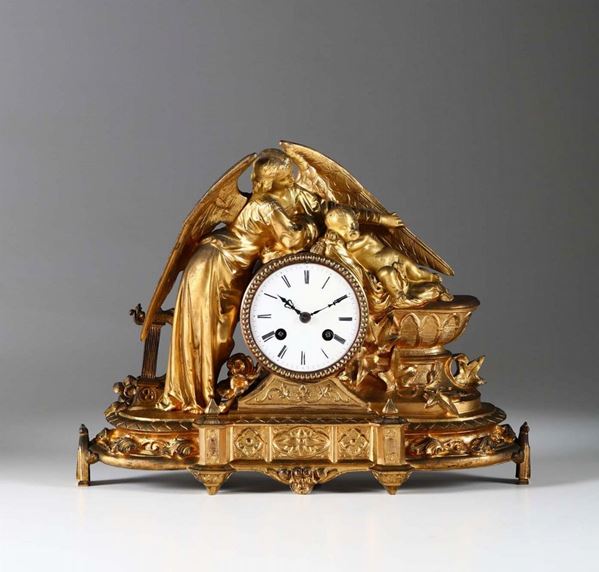 Pendola da tavolo in bronzo dorato con angelo custode, Francia fine XIX secolo