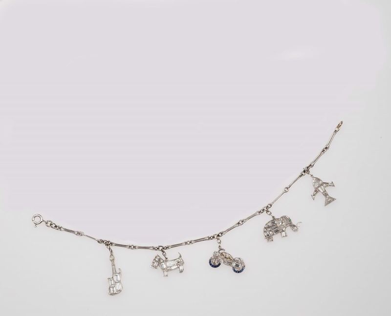 Diamond and sapphire charm bracelet  - Auction Fine Jewels - II - Cambi Casa d'Aste