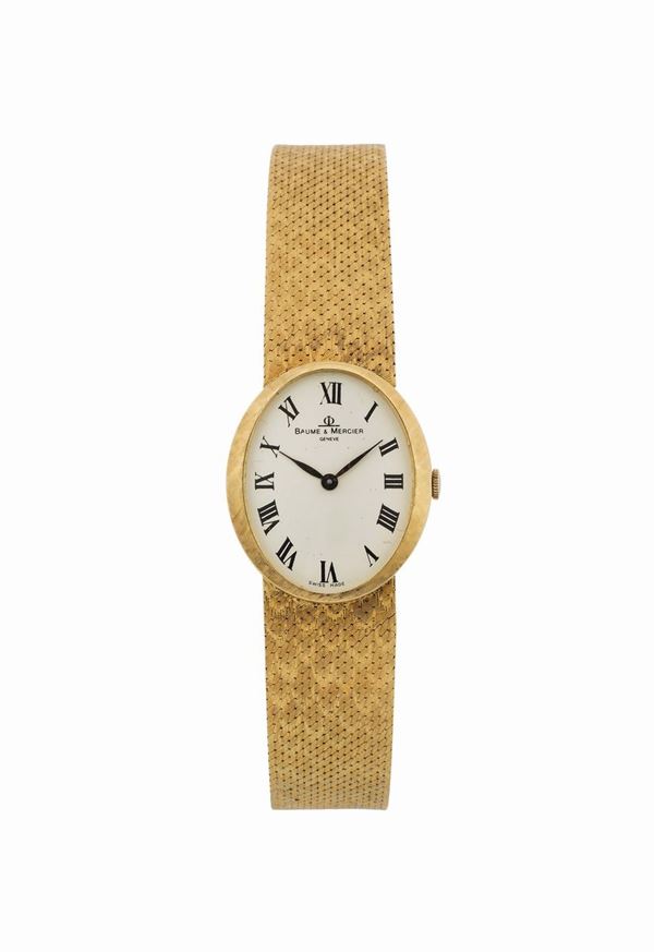 BAUME & MERCIER, Geneve, Ref. 37043, 18K yellow gold, lady's wristwatch with an original gold integrated bracelet. Accompanied by the original box and Guarantee. Made circa 1970
